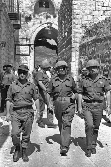 Defense Minister Moshe Dayan, with Uzi Narkis, left, and Chief of Staff  Yitzhak Rabin, right, enter Jerusalem, June 1967. (Photo by Ilan Bruner, courtesy of the Government Press Office, Israel.)