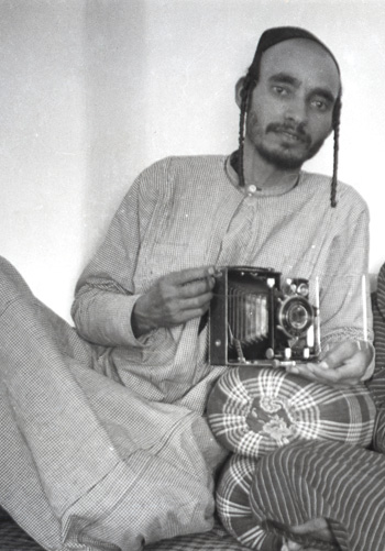 Yihye Haybi in a self-portrait with his camera