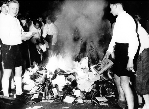 Young Nazi party members and German youth destroy “anti-German” books in a public book burning, Berlin, May 1933. (Courtesy of Associated Press.)