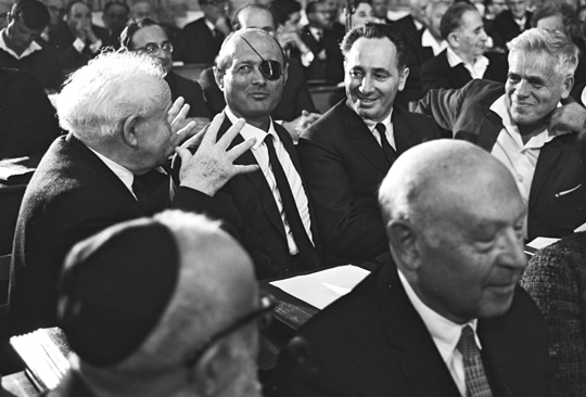 David Ben-Gurion with Moshe Dayan, Shimon Peres, and Ya’acov Hazan during the opening session of the 6thKnesset in Jerusalem.