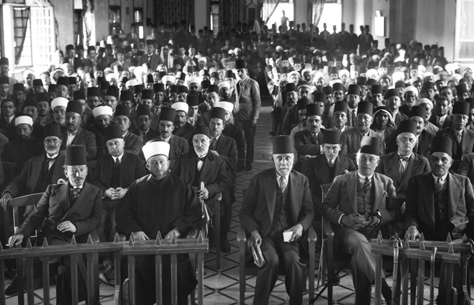 Hajj Ammin al-Husseini (second from left), the mufti of Jerusalem, at a meeting in 1929. (Courtesy of the Library of Congress, Prints and Photographs Division.) 