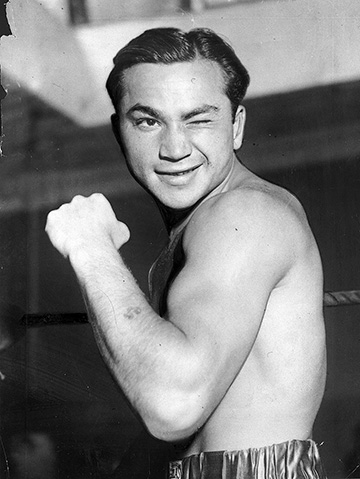 Portrait of professional boxer Barney Ross, 1950. (© Chicago History Museum/Getty Images.) 