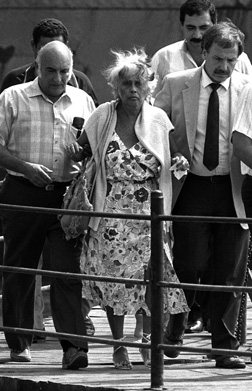 Marilyn Klinghoffer being escorted off the Achille Lauro three days after the murder of her husband, Leon, Port Said, Egypt, October 10, 1985. (© MikeNelson-Jean Claude Delmas/AFP/Getty Images.)