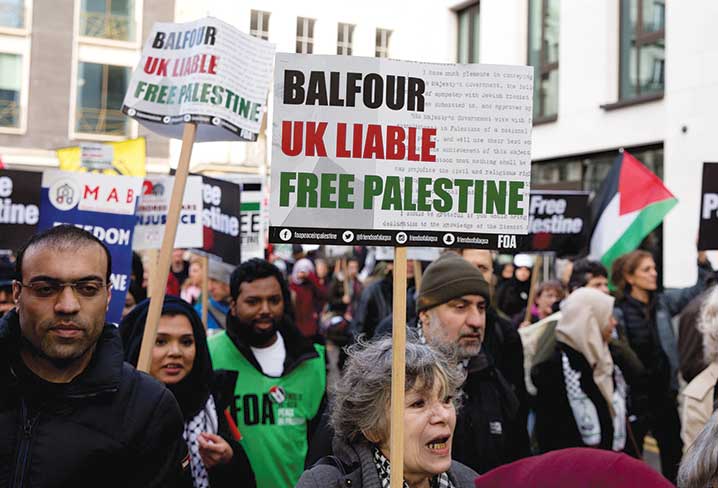 Palestinian supporters march through central London