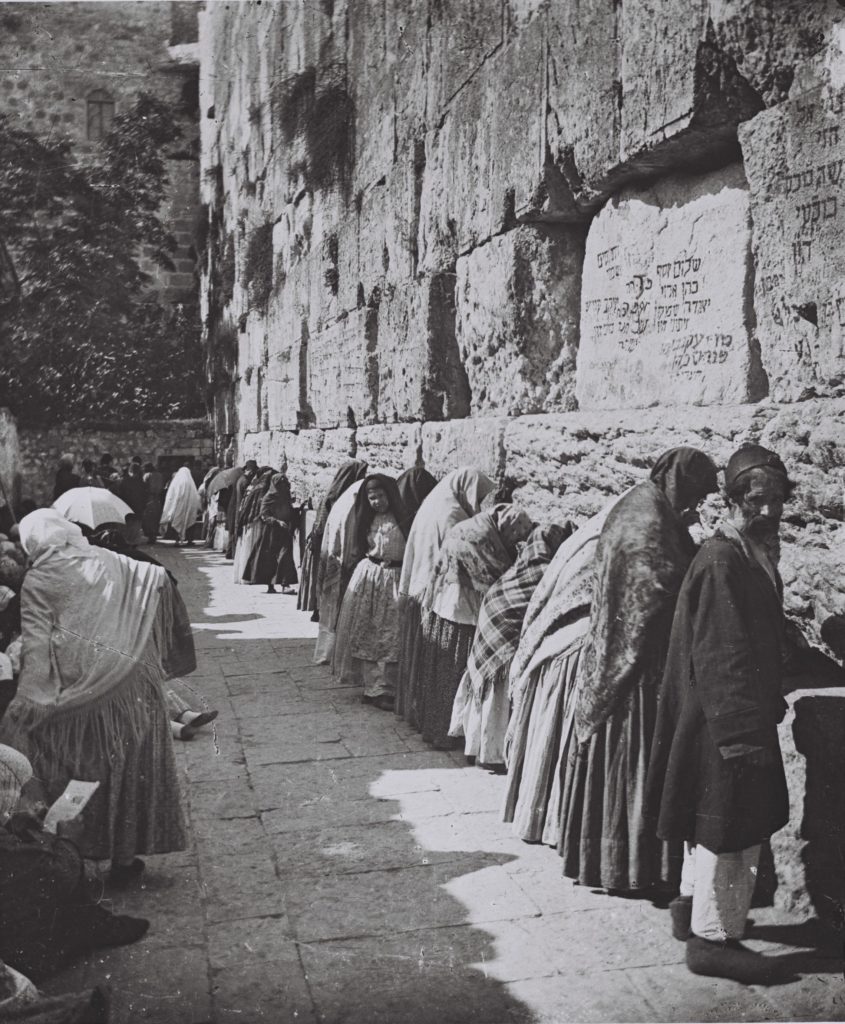 Western wall with men and women praying side by side in 1910.